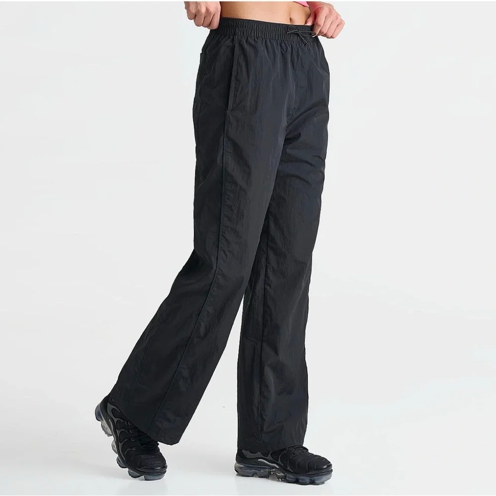 Nike women’s windbreaker high-waisted pants - Picture 4 of 7
